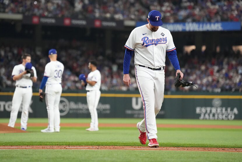 Texas Rangers starting pitcher Jordan Montgomery exits the game after giving up an RBI...