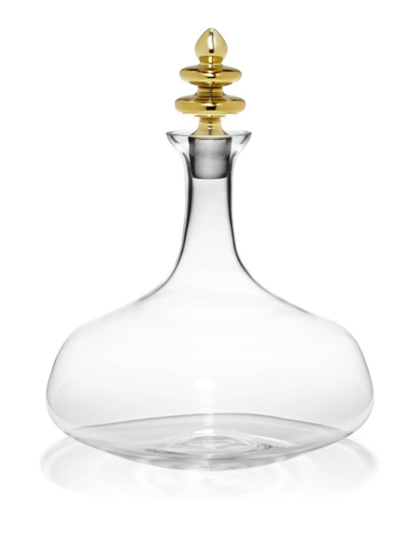 From the Happy Chic collection by Jonathan Adler, this glass decanter is a stylish yet...
