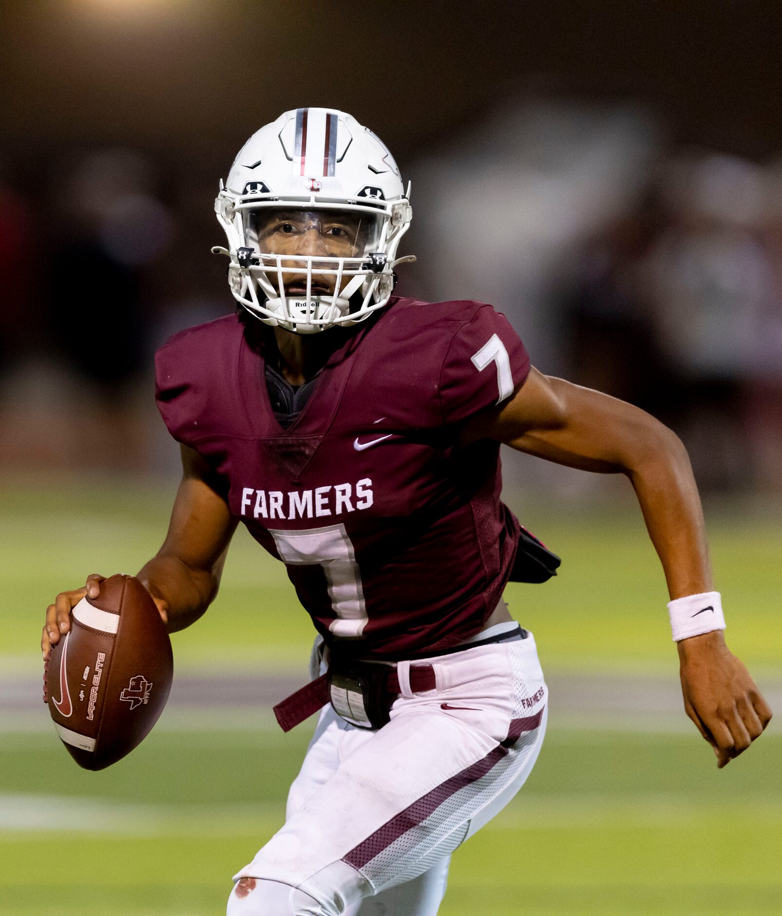 Lewisville junior quarterback Ethan Terrell (7) carries the ball during the first half of a...