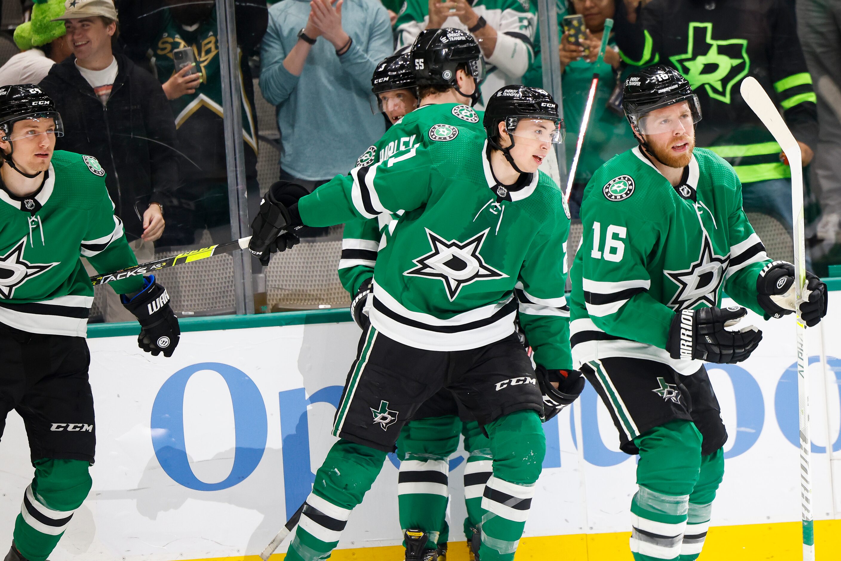 Dallas Stars left wing Jason Robertson (21) and teammates celebrate scoring against Vegas...