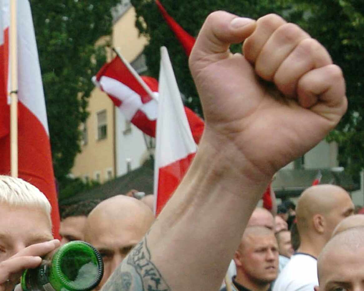 Neo-Nazi sympathizers demonstrate before a commemoration march for Adolf Hitler's deputy...