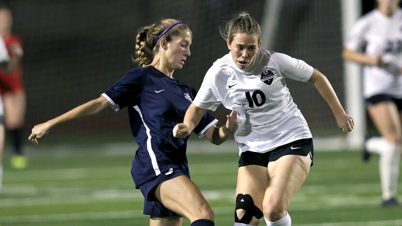 Flower Mound Marcus midfielder Allie Williams (5) tries to get past Flower Mound's Allie...