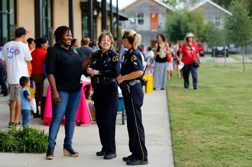 Dallas police (from left) Sgt. Christie Thomas, Assistant Chief Christina Smith and Senior...