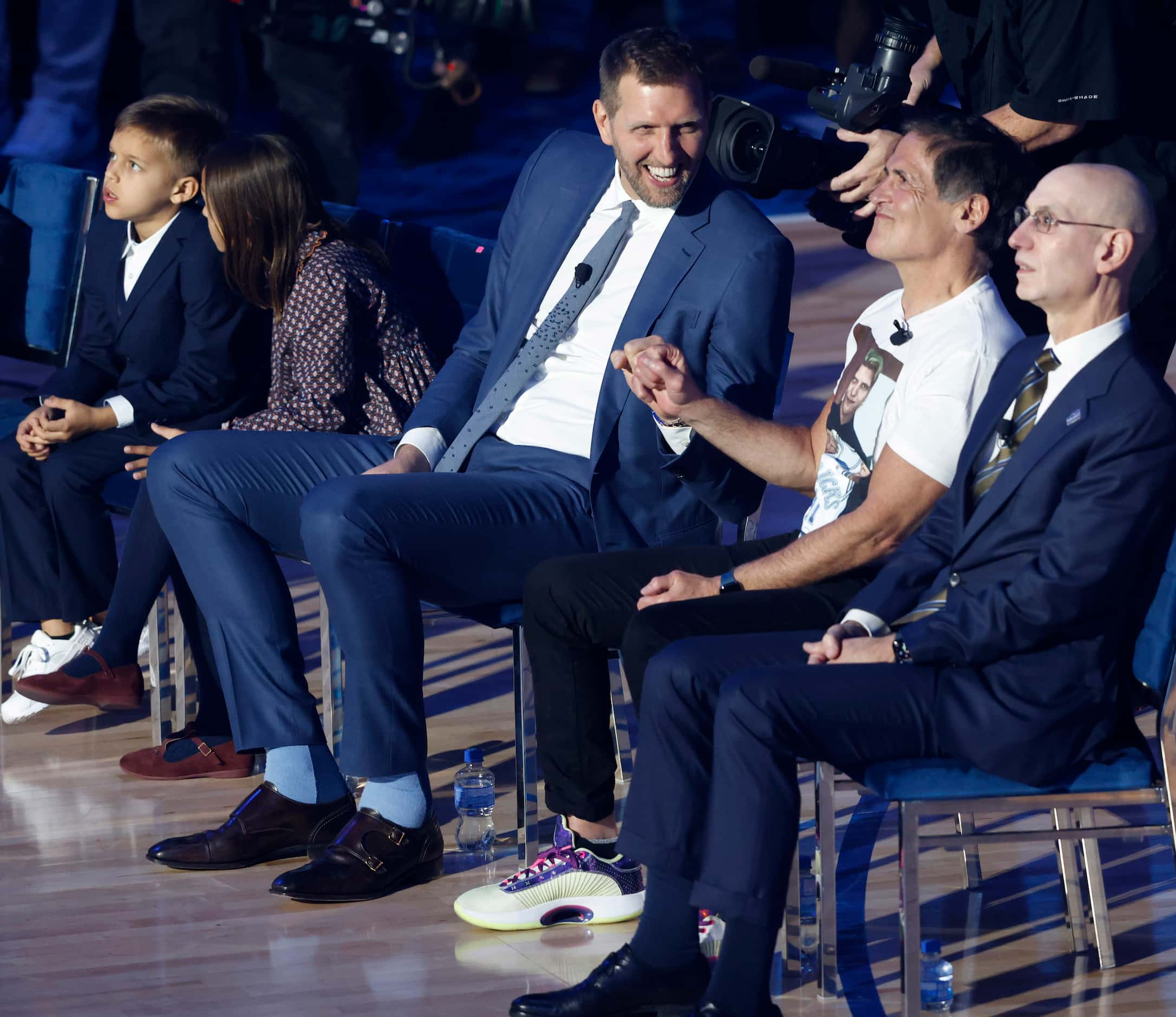 Former Dallas Mavericks player Dirk Nowitzki shares a laugh with Dallas Mavericks owner Mark...