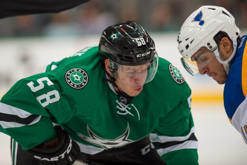 Sep 29, 2015; Dallas, TX, USA; Dallas Stars center Mattias Janmark-Nylen (58) fights for the...