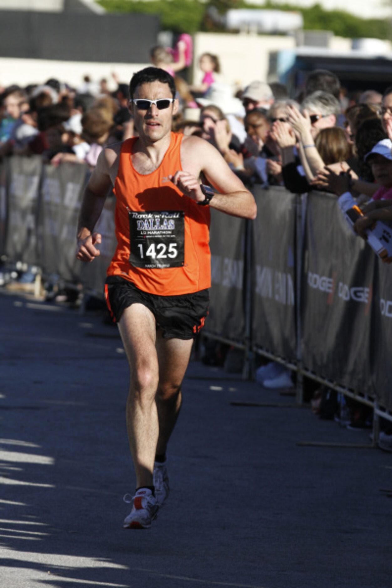 Ryan Delgado runs in the Dallas Rock 'N' Roll half marathon on Sunday, March 25, 2012.