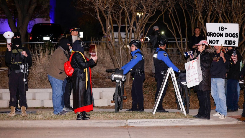 Armed leftists (left) oppose right-wing protesters outside an all-ages drag show at Texas...