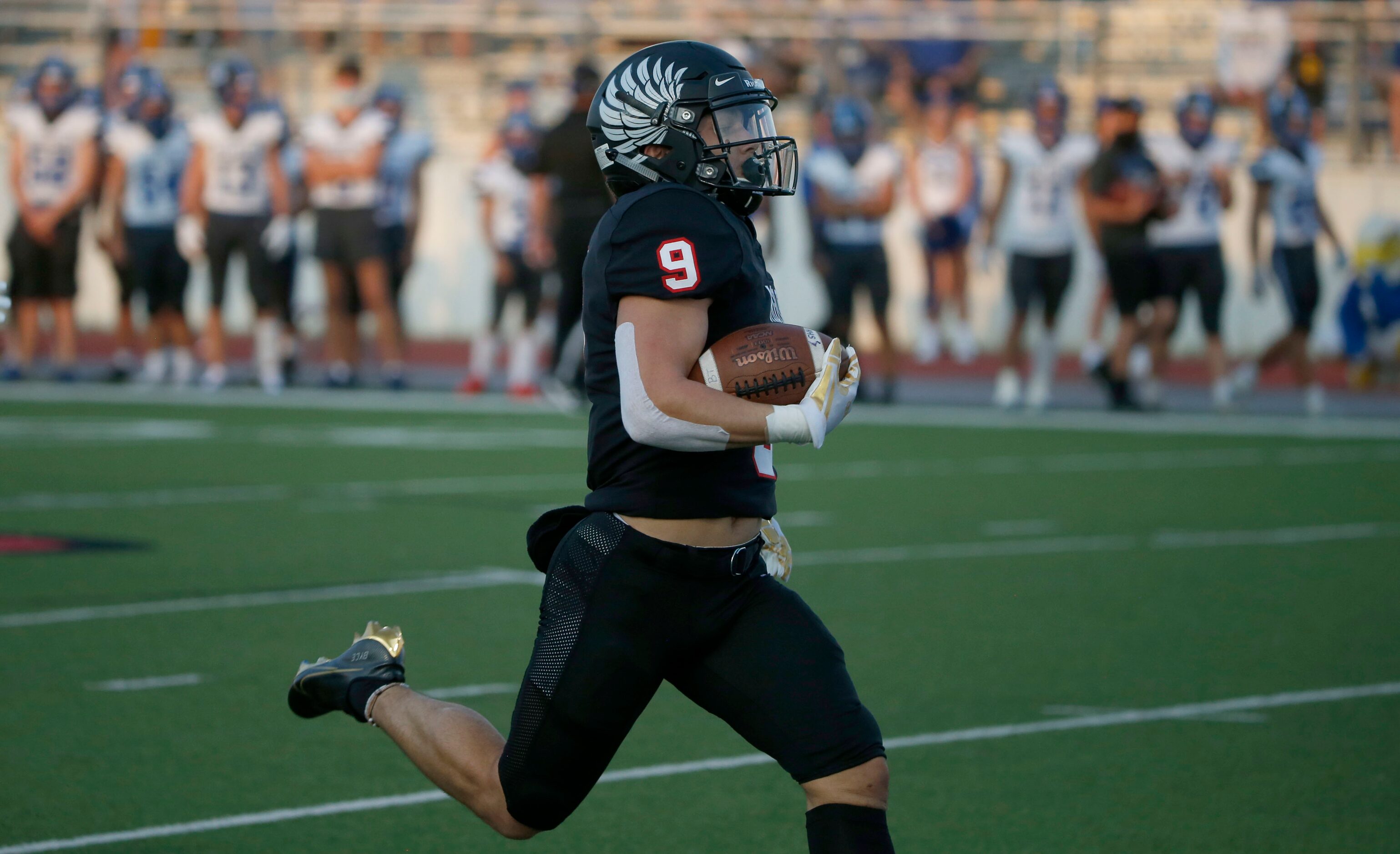 Argyle's Tito Bryce (9) scores on a long rushing touchdown can the first play against...