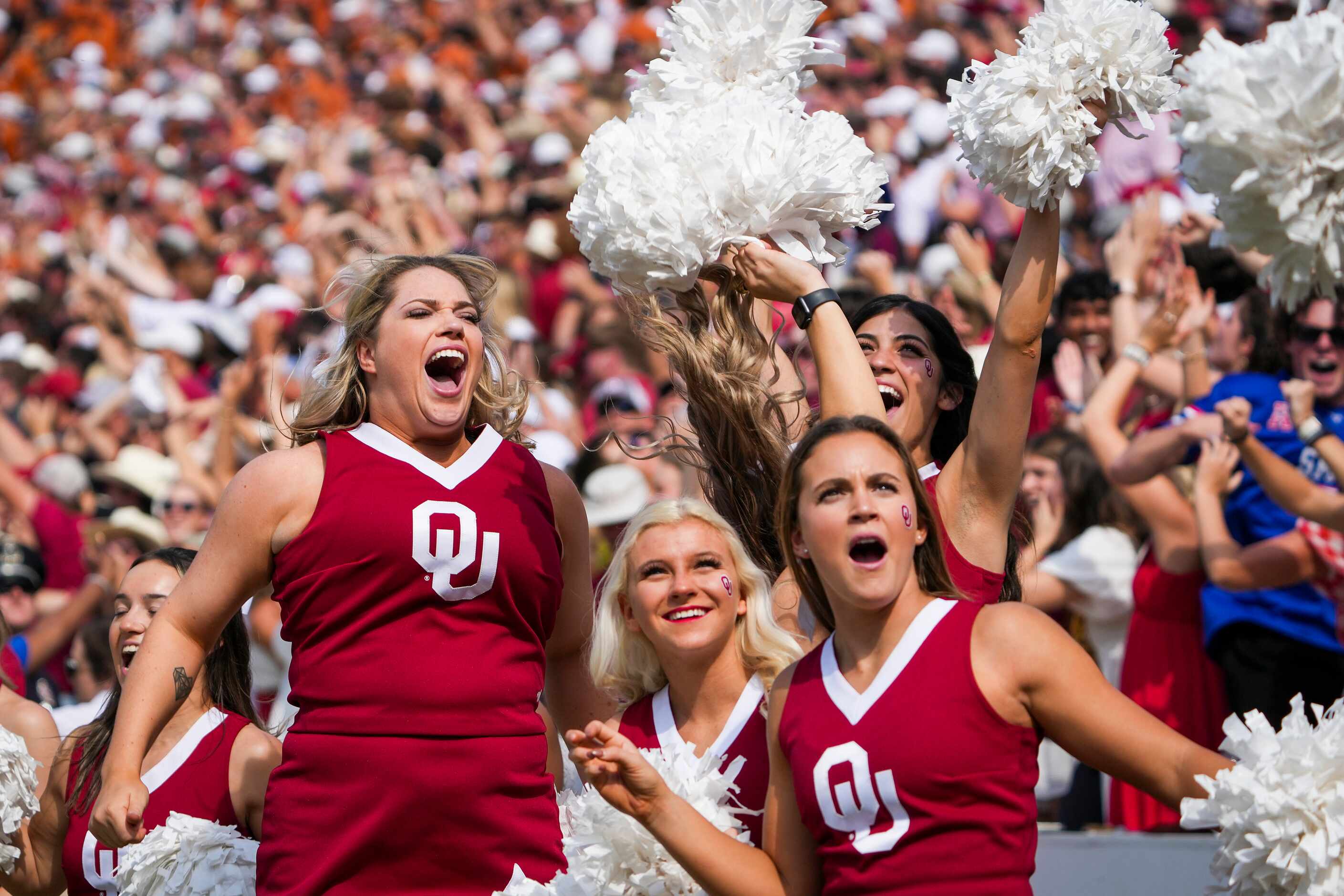 Oklahoma cheerleaders celebrate a first down on a fake field goal during the first half of...