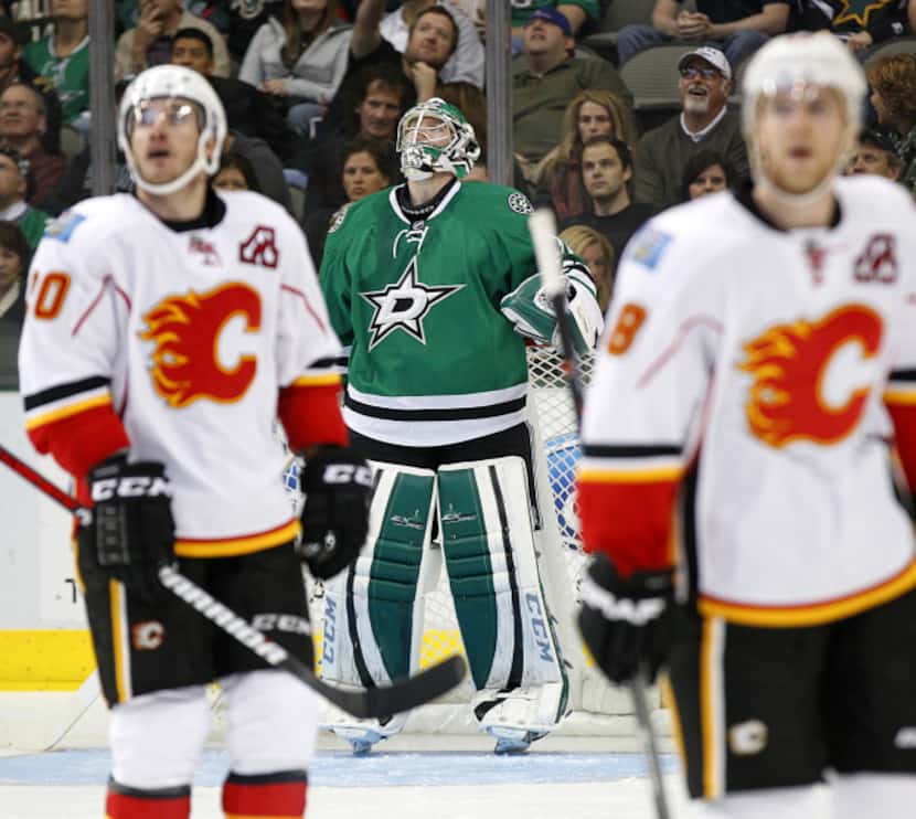 Phoenix Coyotes goalie Mike Smith makes a leap against the Dallas Stars' at American...