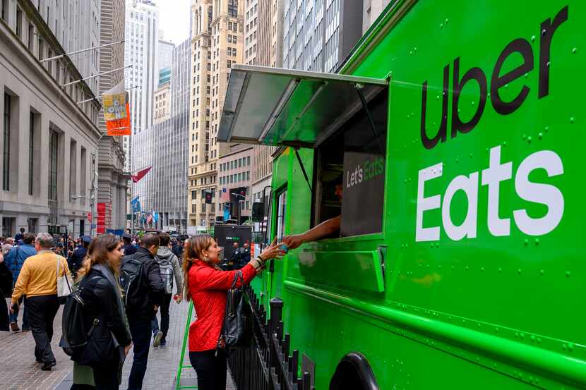 Uber is cutting 350 jobs in its food delivery and self-driving car division in what the...