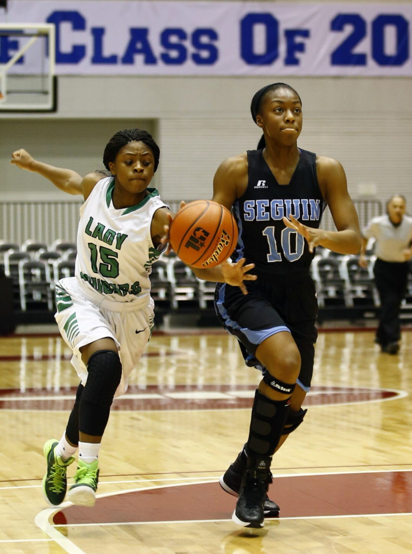 Bryan Adams' DeBrashia Baty (15) pressures Arlington Seguin's Khilyn Cooper (10) during the...