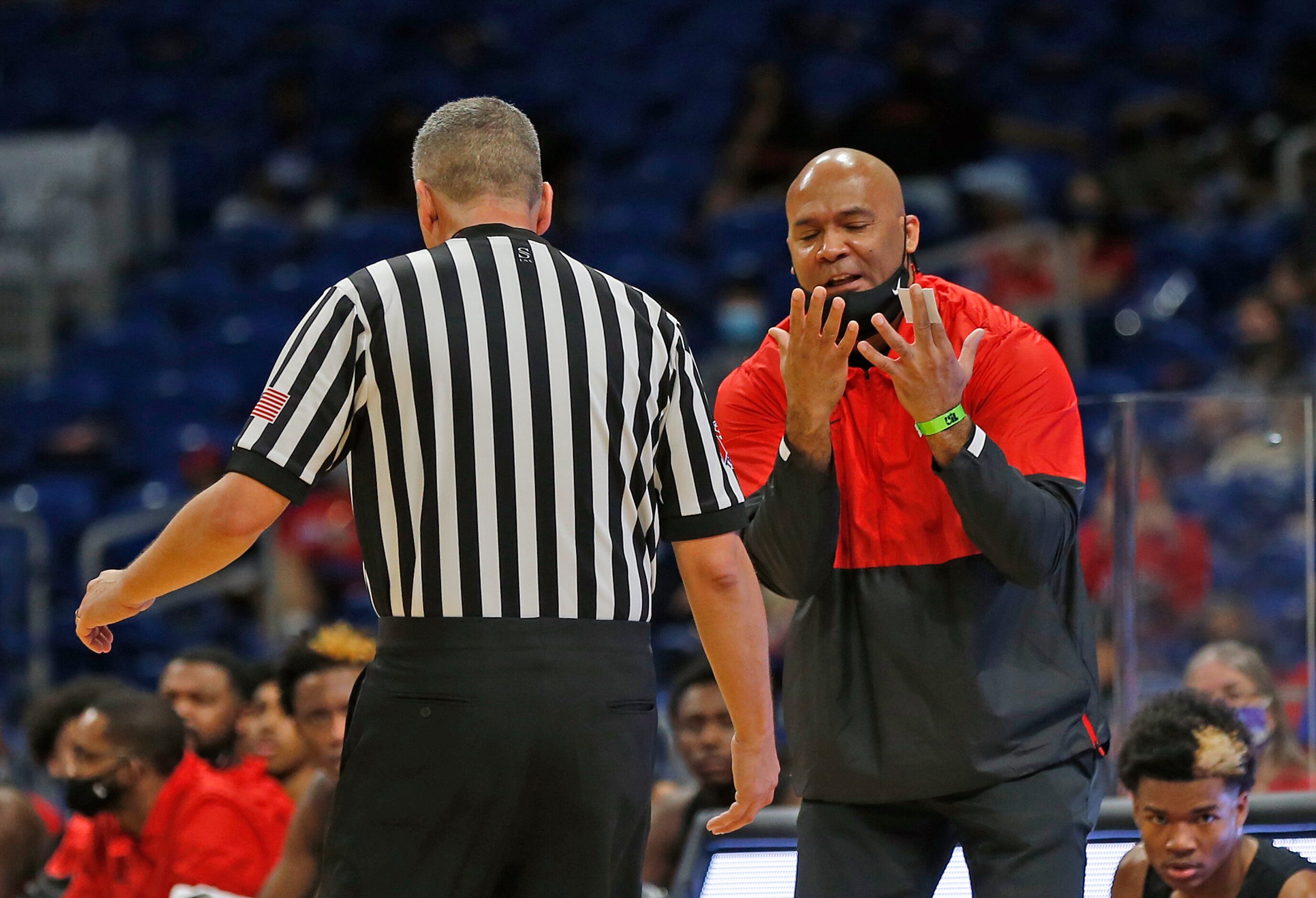 Duncanville head coach David Peavy argues a call. UIL boys Class 6A basketball state...