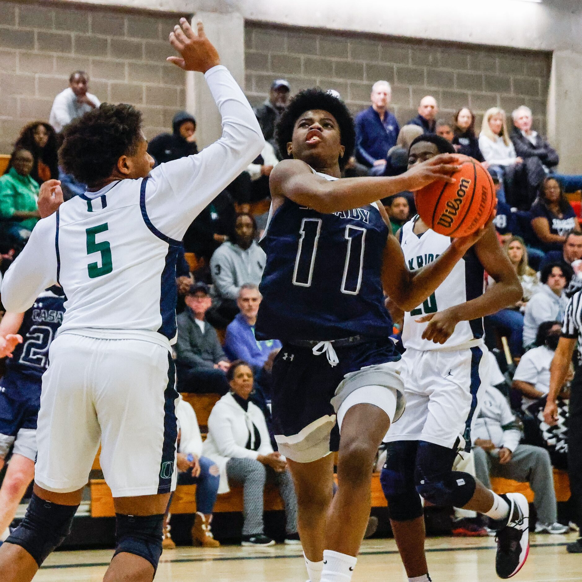 Oakridge Owls' Rayman Hines (5) tries to block a shot from Casady Cyclones' Kaden Leacxhe...