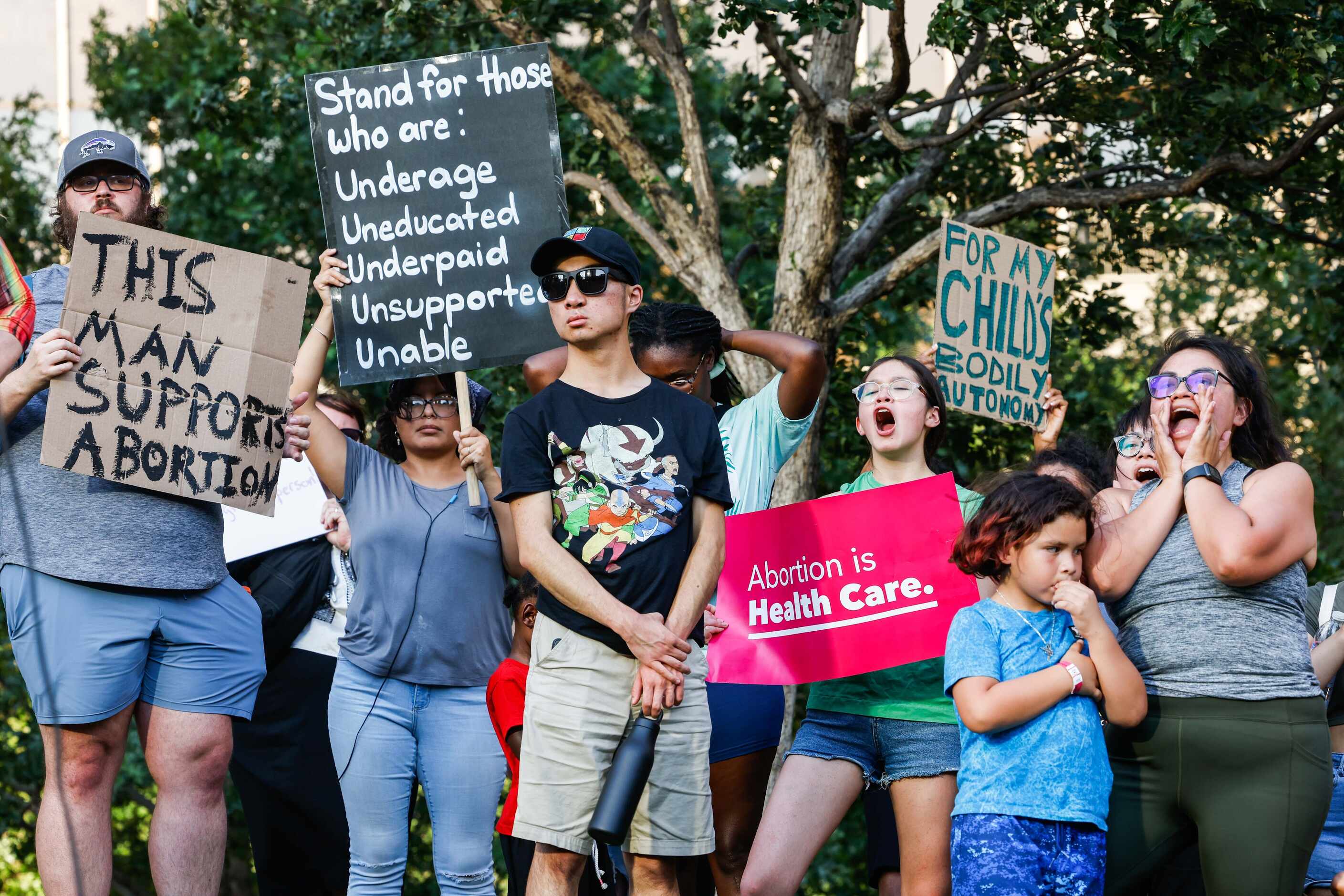 A group of demonstrators gather at the Civic Garden in downtown Dallas on Friday, June 24,...