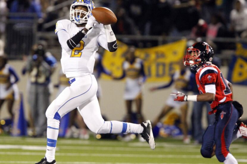 Corsicana's Christian Hines (2) can't hold onto a pass as Frisco Centenniel defender...