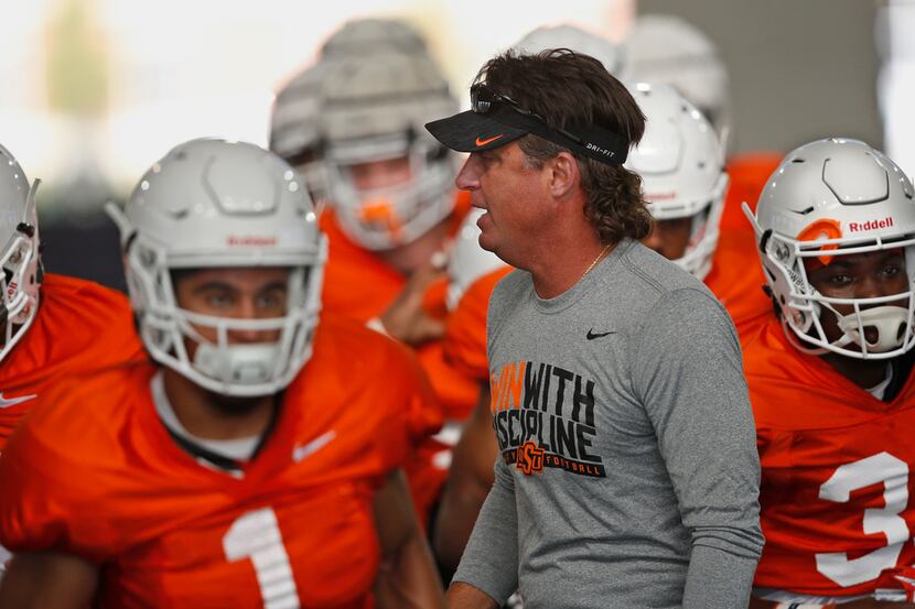 Oklahoma State head coach Mike Gundy during an NCAA college football practice in Stillwater...