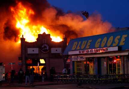 On March 2, 2010, Dallas Fire-Rescue firefighters attempted to control the flames as fire...