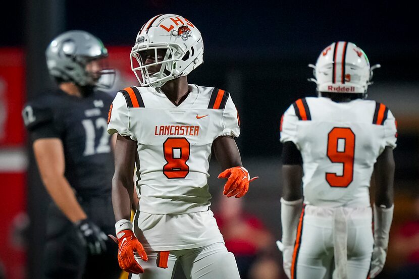 Lancaster defensive back Corian Gipson (8) looks to the bench during the first half of a...