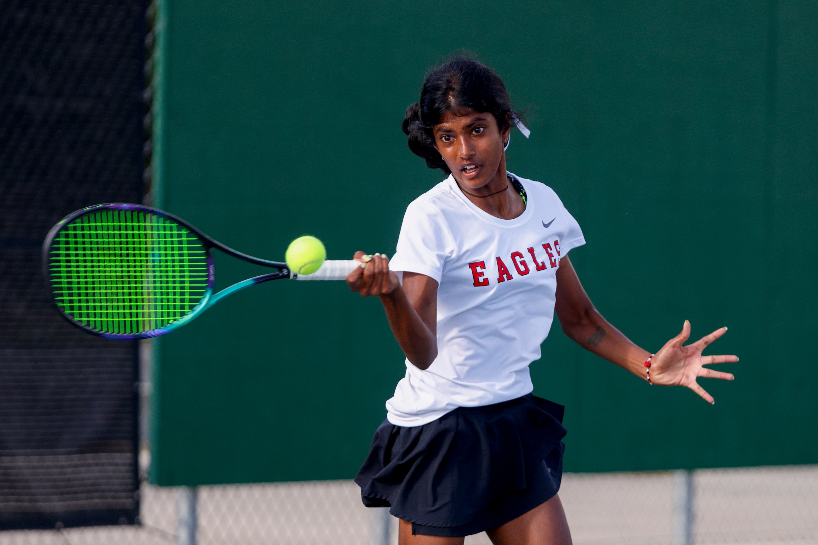 Argyle’s Meghna Arun Kuma hits the ball during the 4A girls singles championship match at...