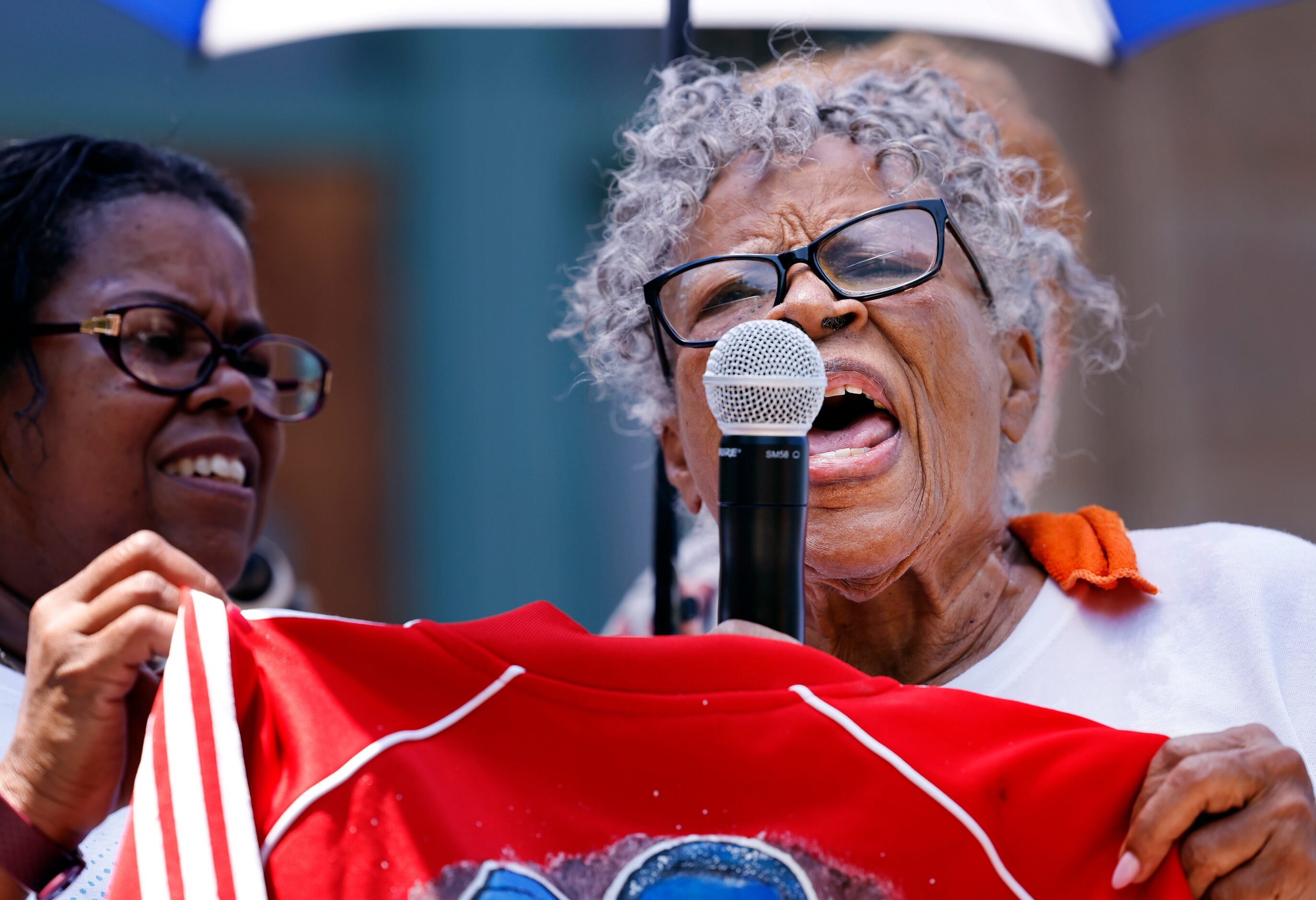 After cooling down from her march, Opal Lee, 94, (right) spoke to supporters outside the...