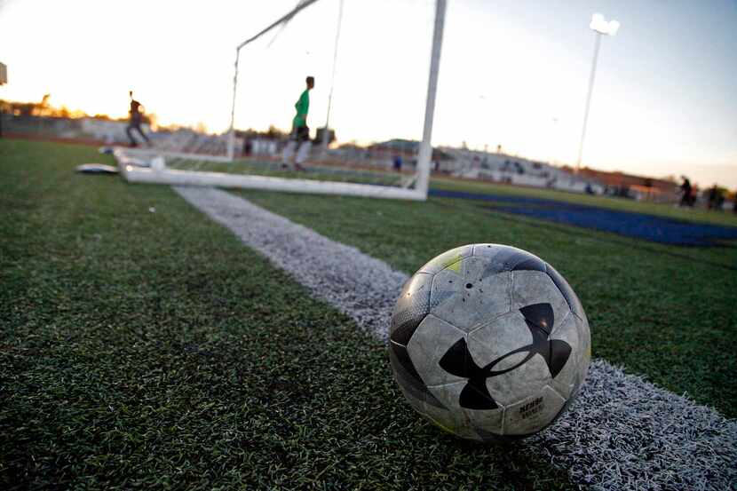 The teams warm up as Summit High School hosted Waxahachie High School in a soccer match at...
