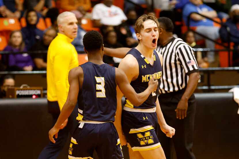 McKinney’s Jackson Steele, right, celebrates a three-point basket with Jacovey Campbell (3)...