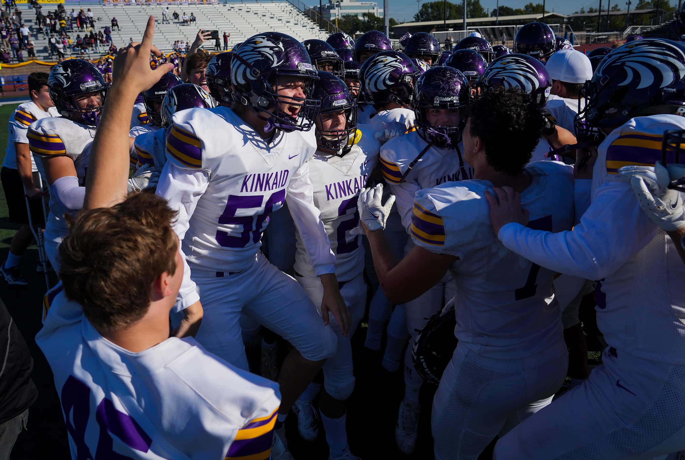 Houston Kinkaid players, including Cade Brown (56) celebrate after defeating Episcopal...