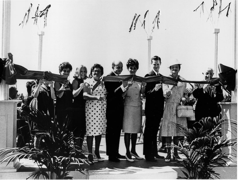 Raymond Nasher and Pasty Nasher (center) lead the ribbon cutting at NorthPark Center in 1965. 
