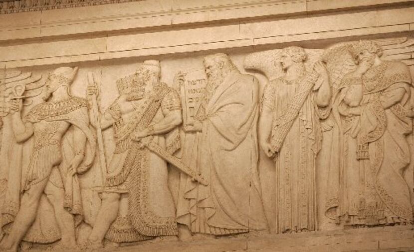 Moses carrying the Ten Commandments is among the lawmakers and leaders depicted on friezes...