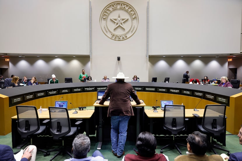 Opponent James Hatley (wearing cowboy hat) speaks before Dallas City Council  during...