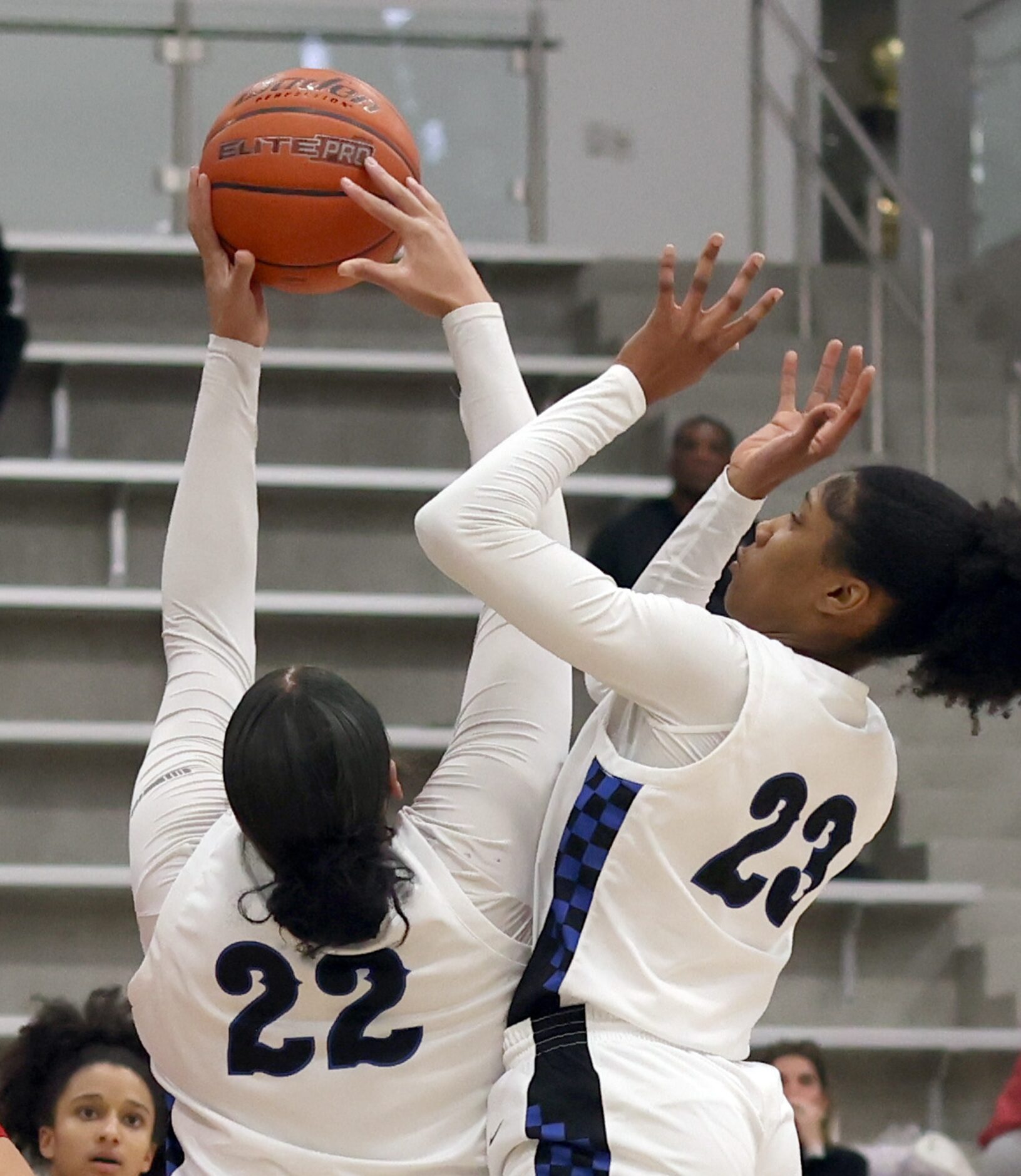 Hebron center Jordan Thomas (22), left, and guard Paris Bradley (23), collide as they...