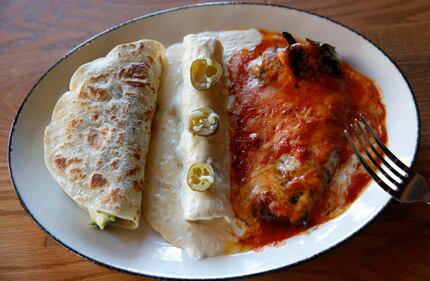 The brisket taco, on the left, can come as a combo platter with other tacos and enchiladas...