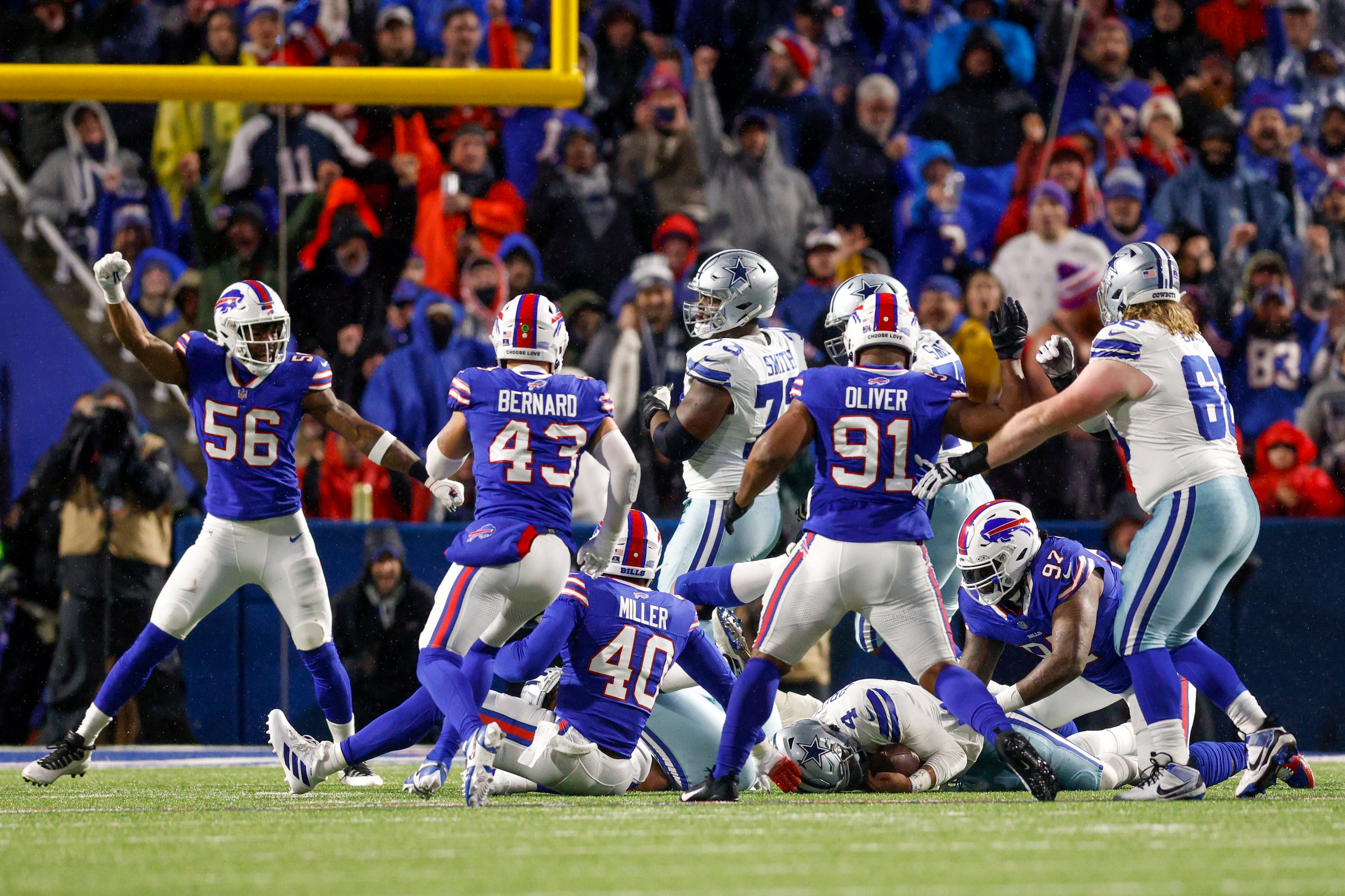 Dallas Cowboys defensive end Dante Fowler Jr. (56) celebrates a sack of Dallas Cowboys...