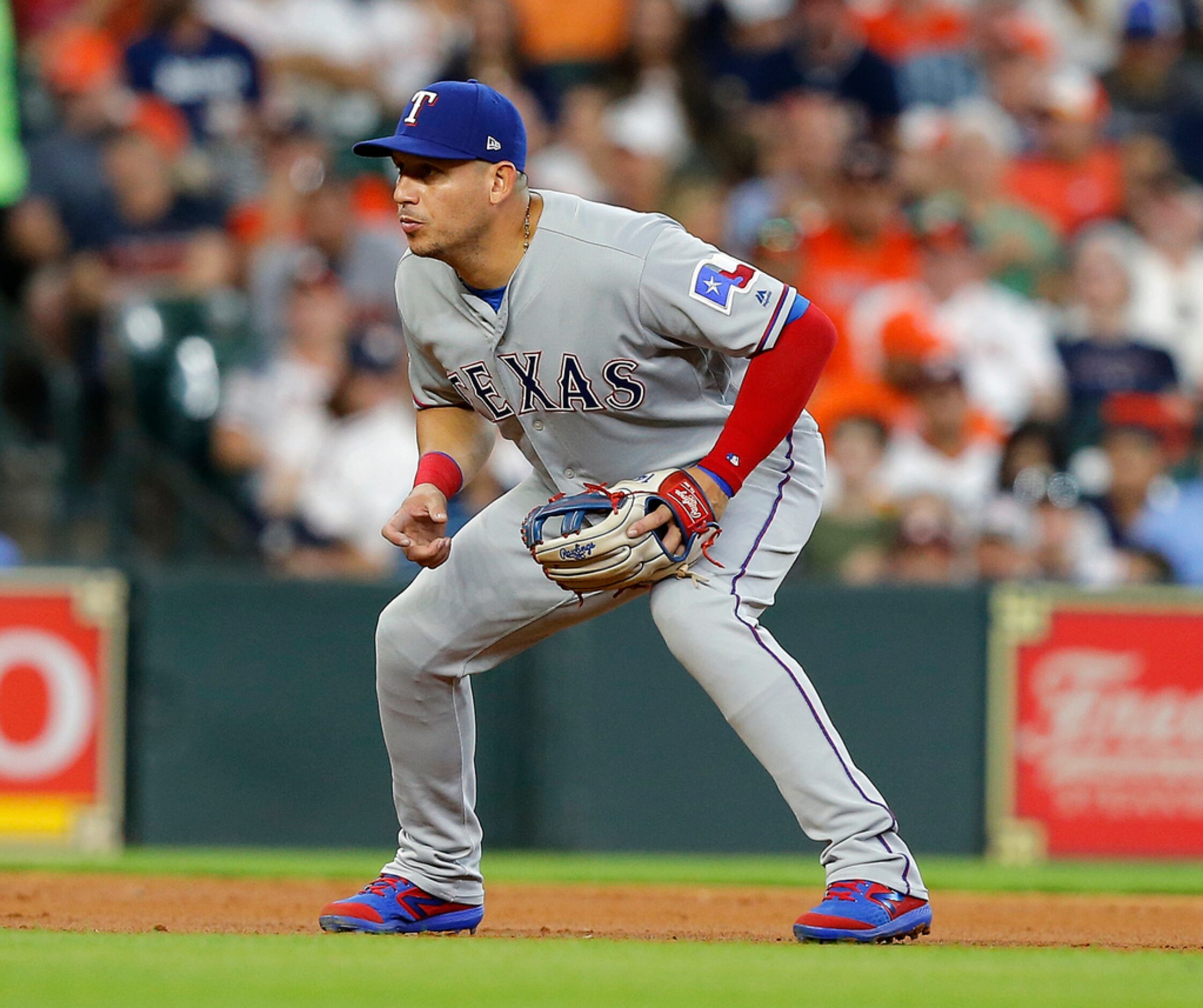 HOUSTON, TEXAS - JULY 20: Asdrubal Cabrera #14 of the Texas Rangers during game action...