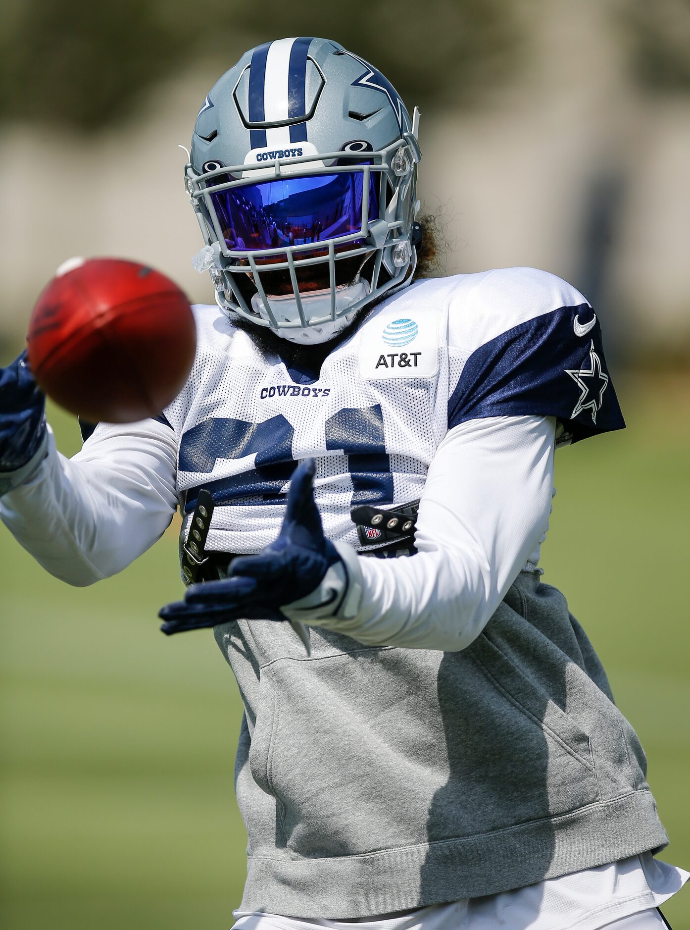 Dallas Cowboys running back Ezekiel Elliott (21) catches a pass during practice at The Star...