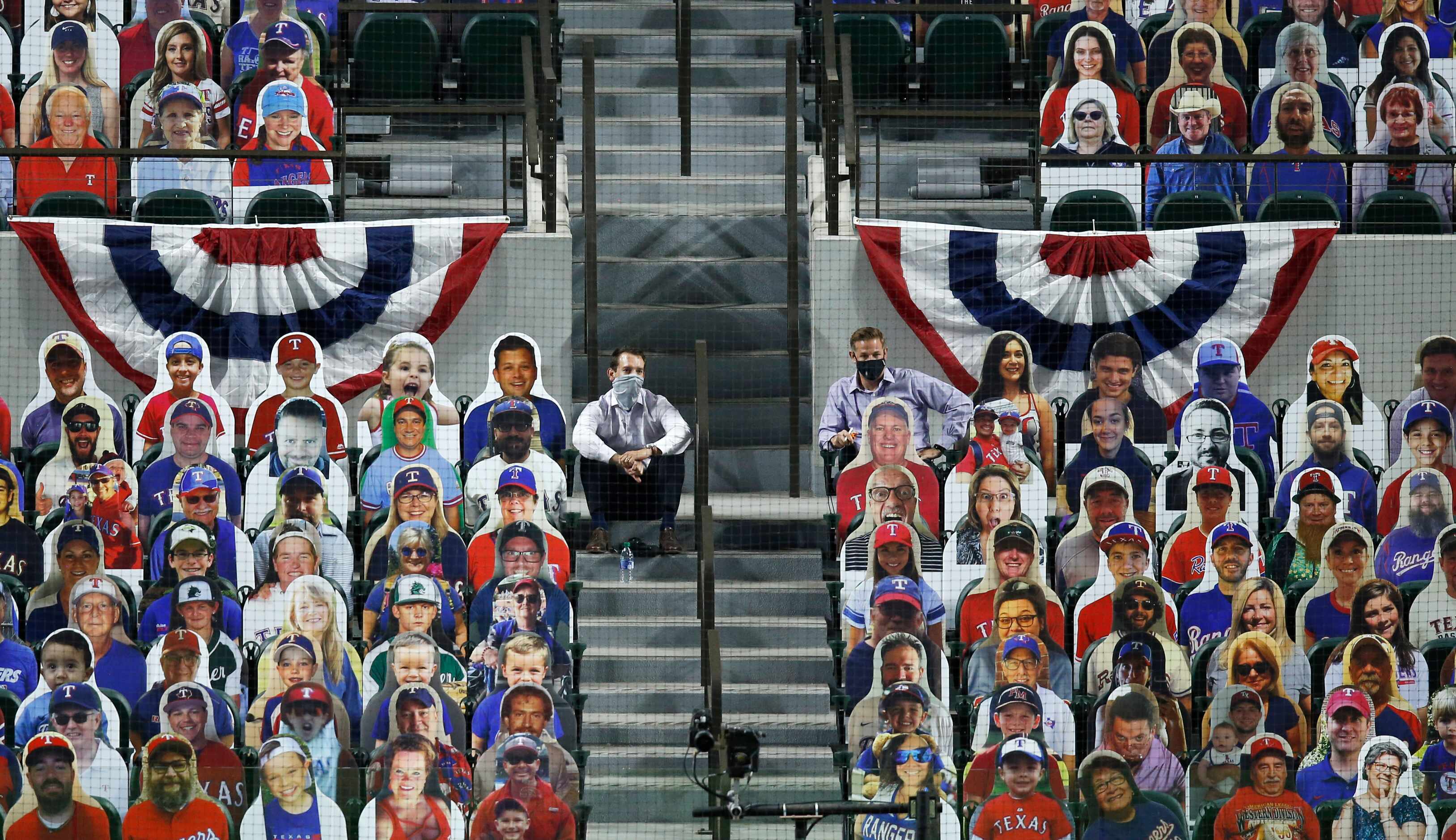 A few real people amongst the DoppelRangers in the stands during opening day at Globe Life...