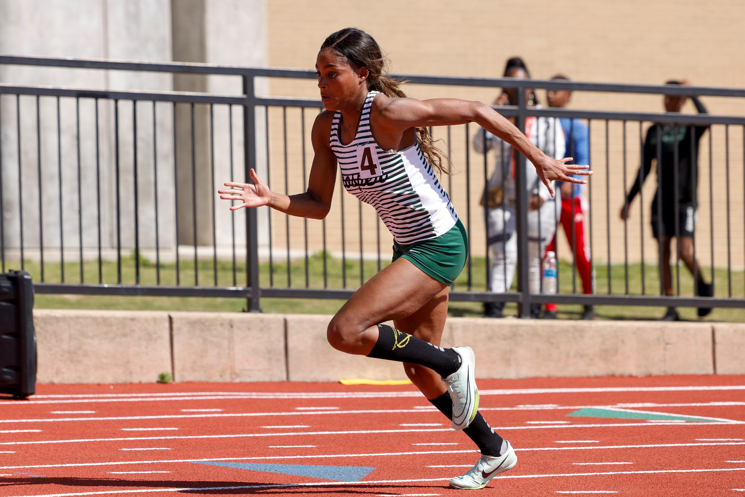 Prosper’s Lauren Lewis runs the 400 meter dash during the Jesuit-Sheaner Relays at Jesuit...