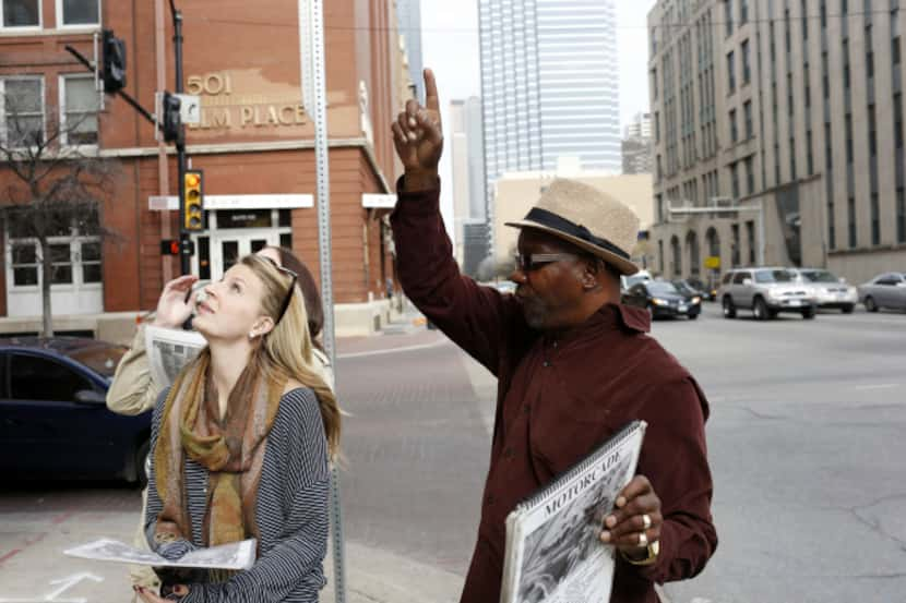 Lacey Gardner (front) and Chelsey Healy listen as Ron Washington points out the window on...