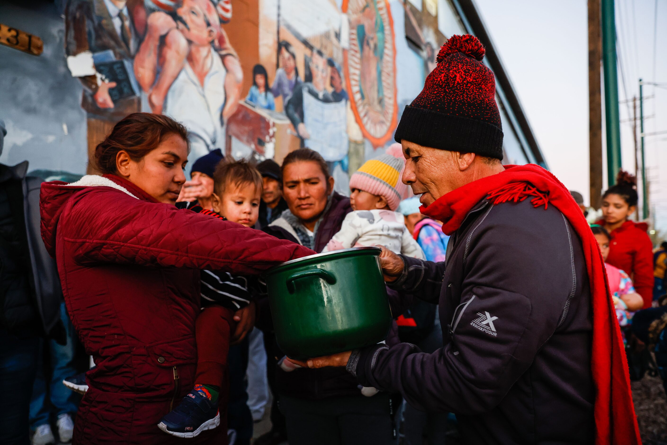 Jose Castañeda, from Xacatecas, Mexico but has lived in El Paso for 30 years, gives away...