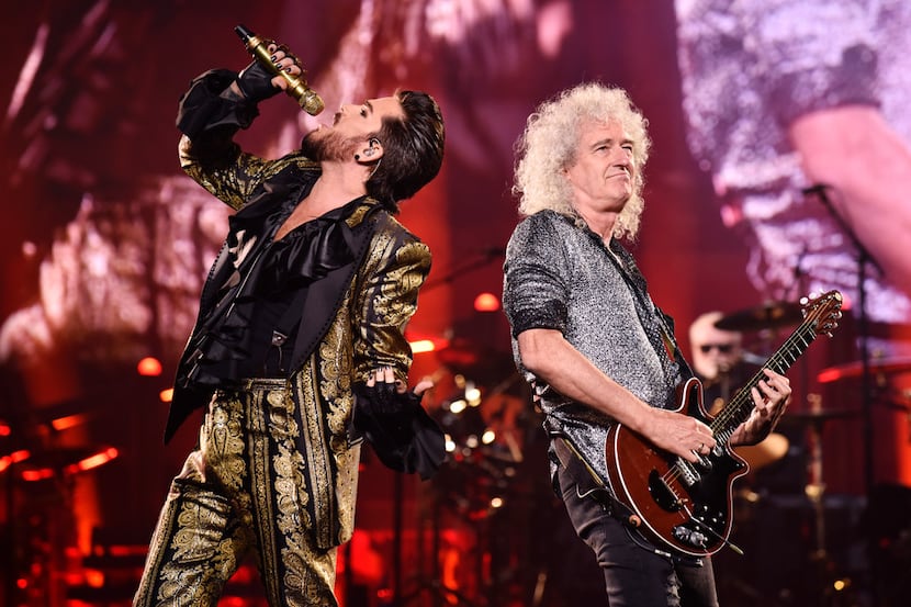 Singer Adam Lambert, left, alongside guitarist Brian May during the Queen + Adam Lambert...