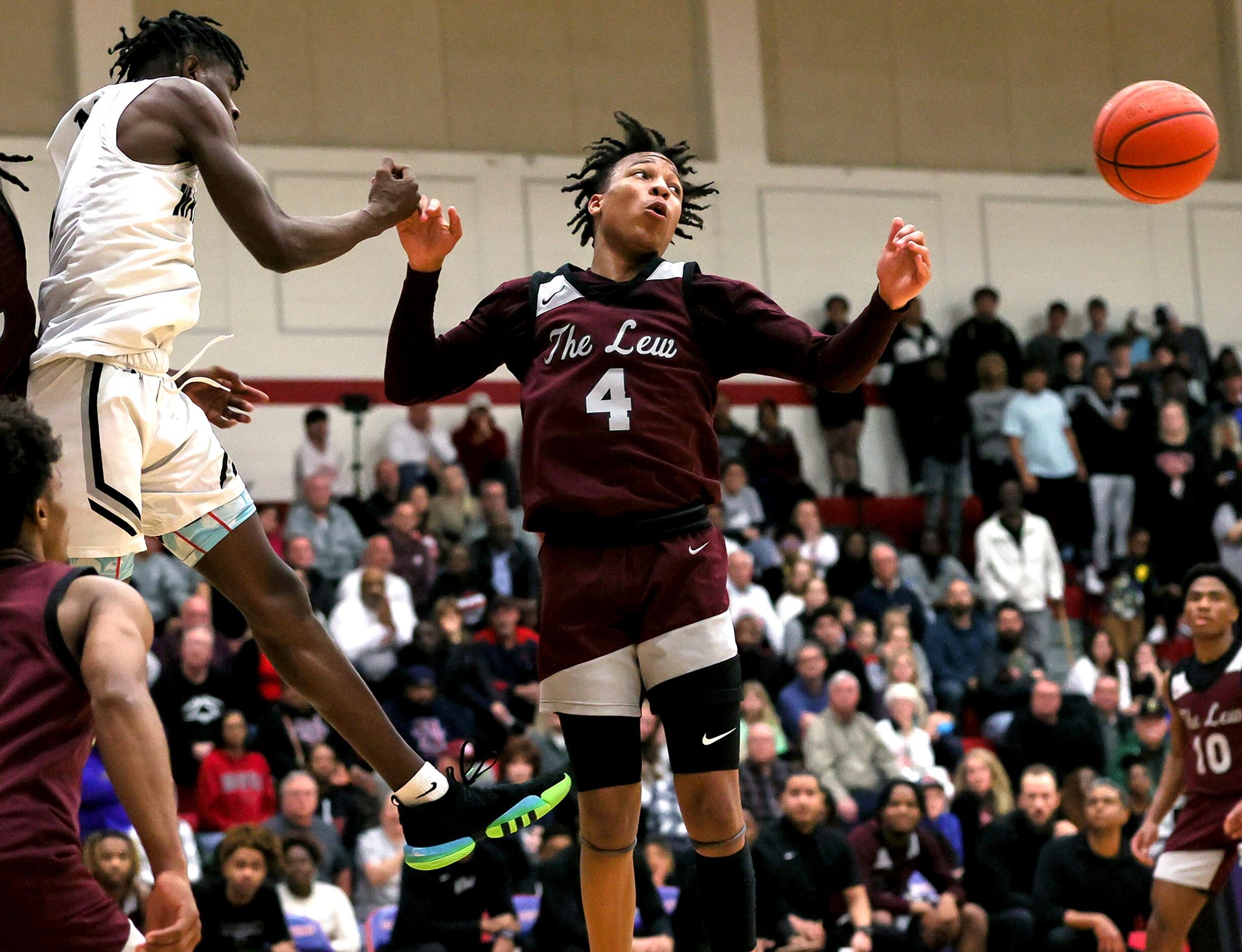 Lewisville guard Rakai Crawford (4) loose the ball against Arlington Martin guard Jeremiah...