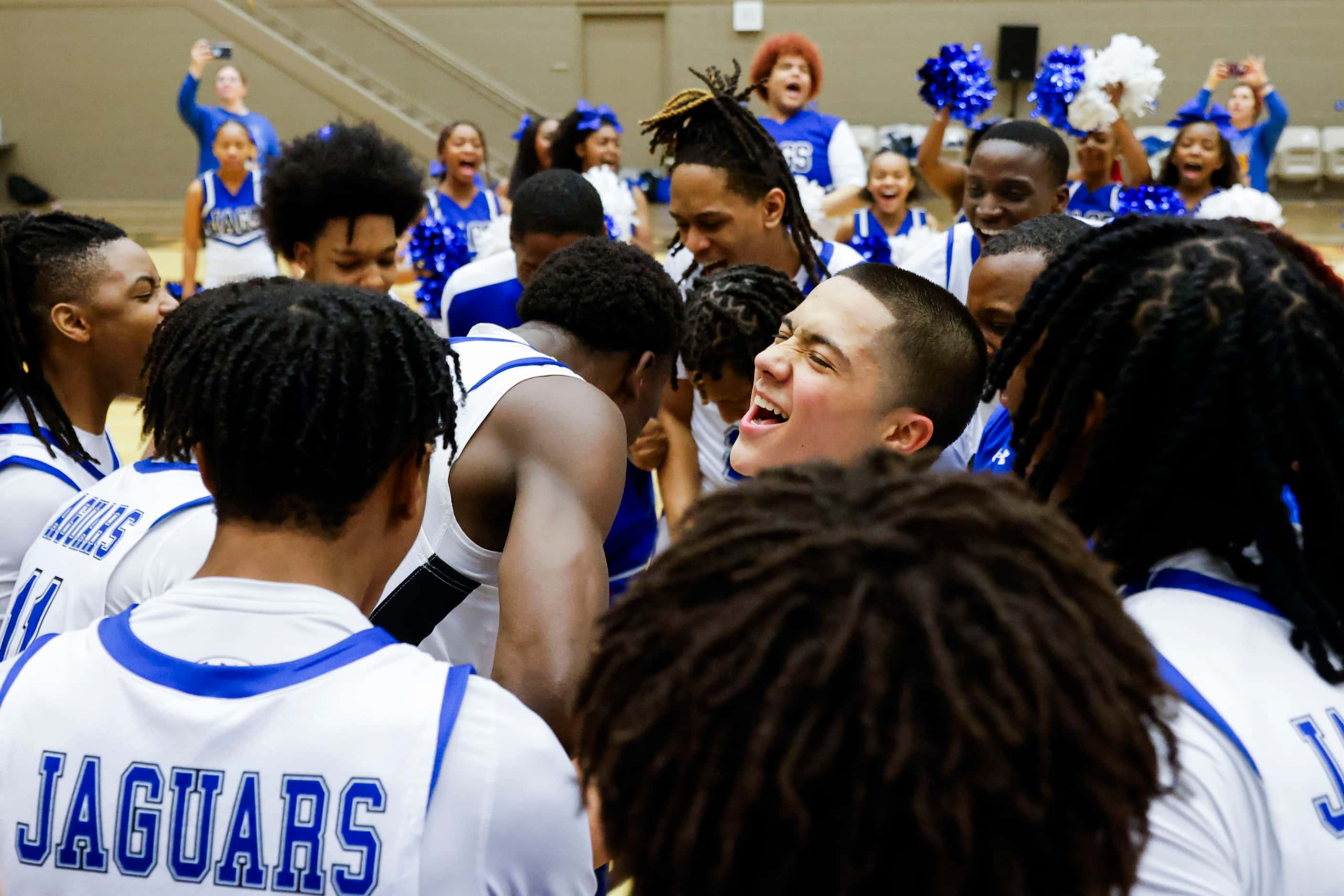 Mansfield Summit High players including Theo Brannan celebrates the victory against Denton...