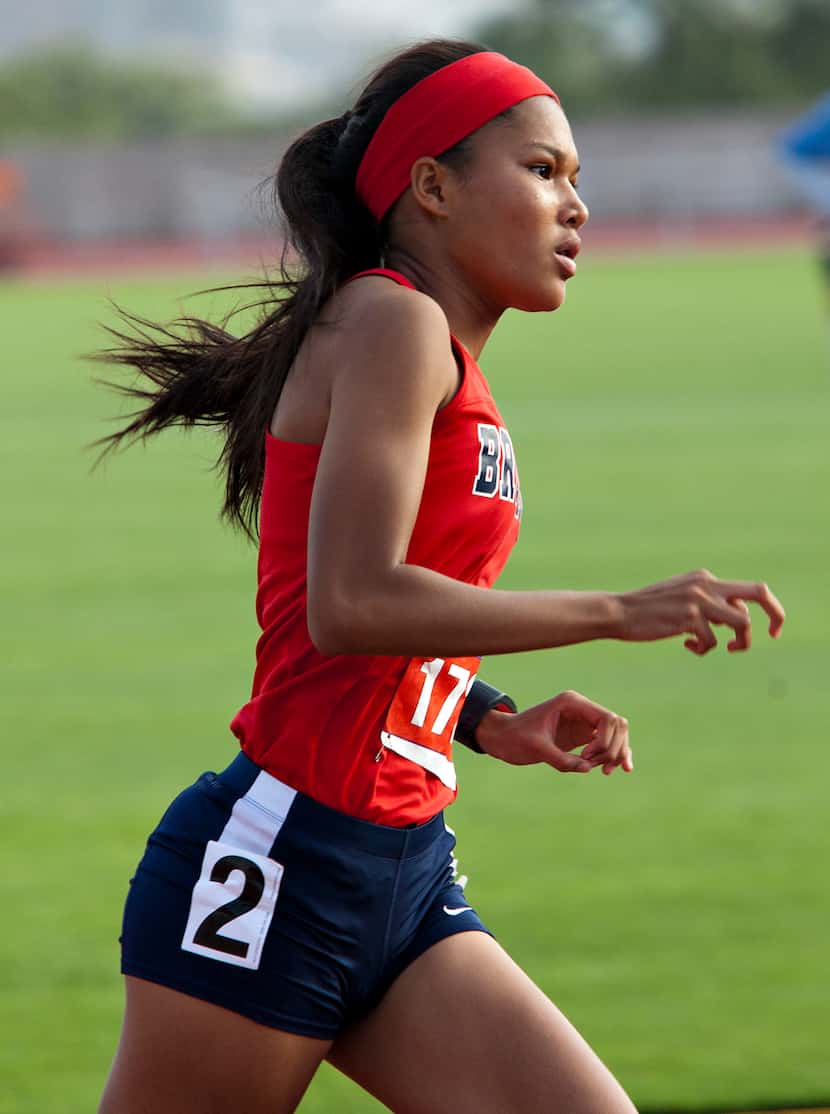 Mckinney Boyd's Aaliyah Miller rounds the corner during the 800 meter run at the 6A UIL...