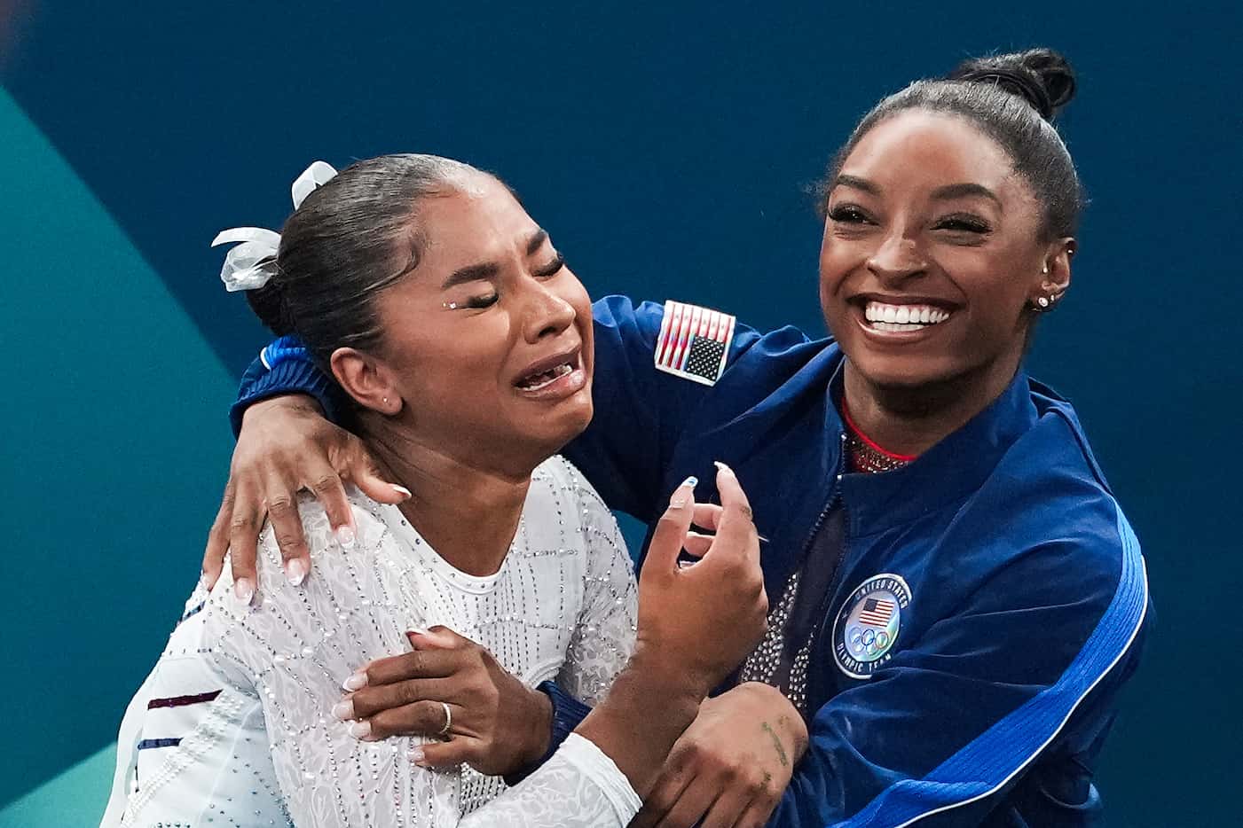 Bronze medalist Jordan Chiles (left) and silver medalist Simone Biles of the United States...