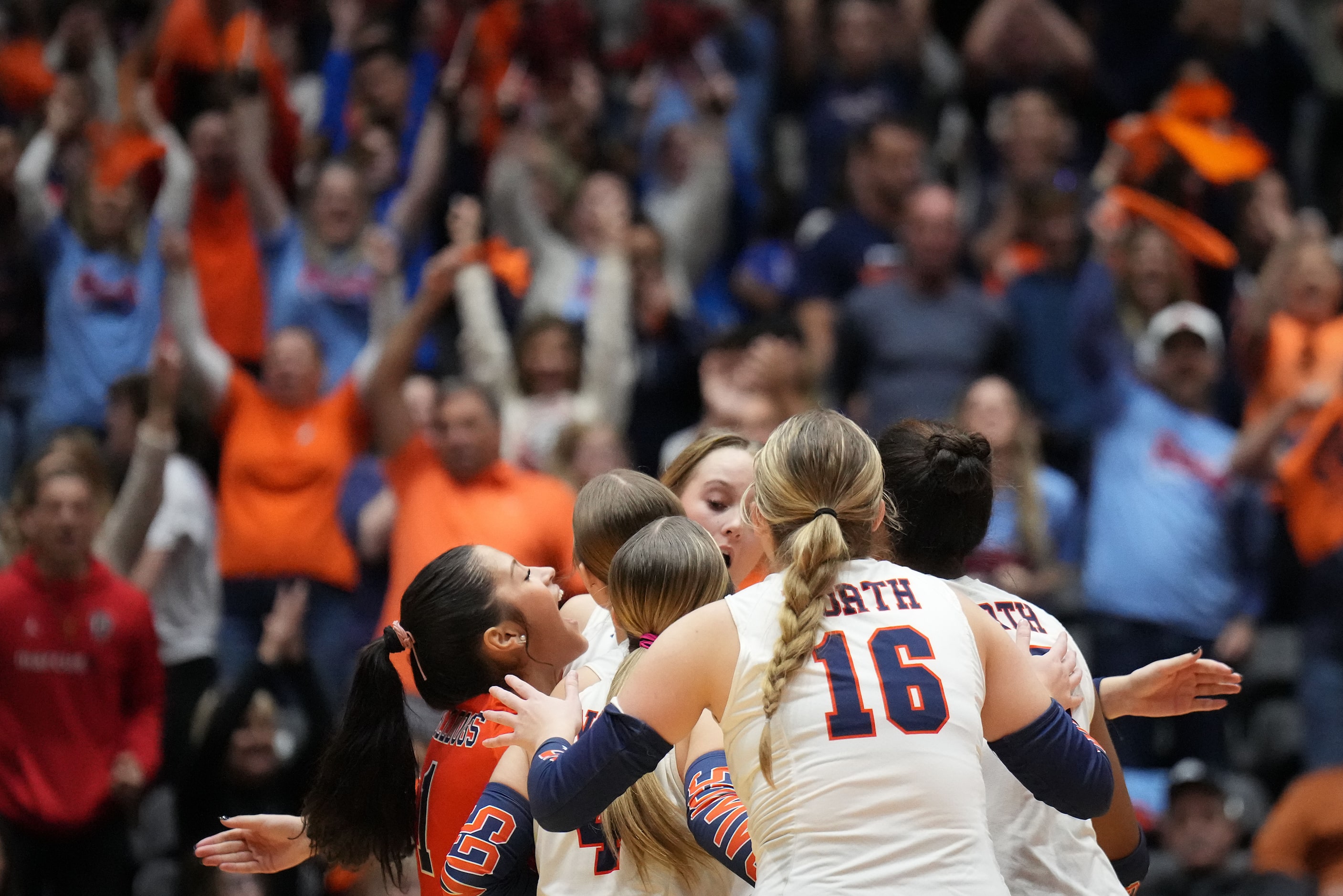 McKinney North players celebrate after winning the first set of the UIL Class 5A Division I...