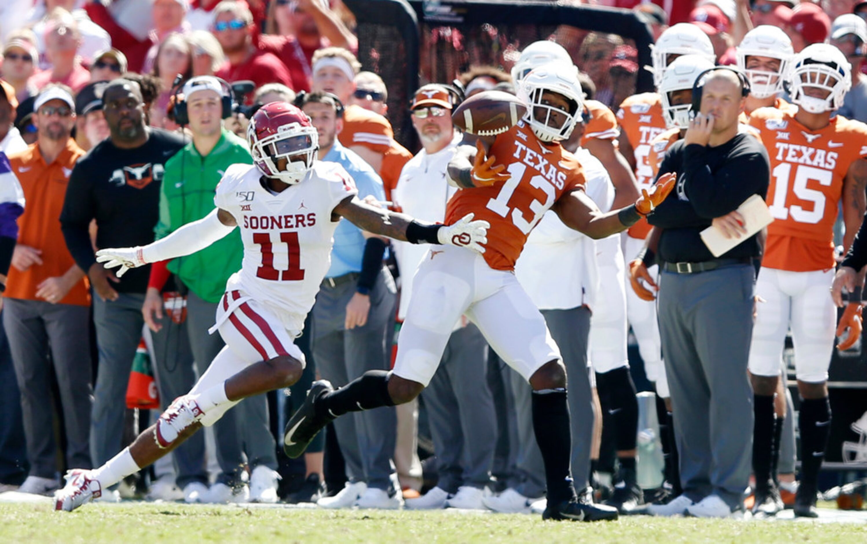 Texas Longhorns wide receiver Brennan Eagles (13) can't make the catch as Oklahoma Sooners...