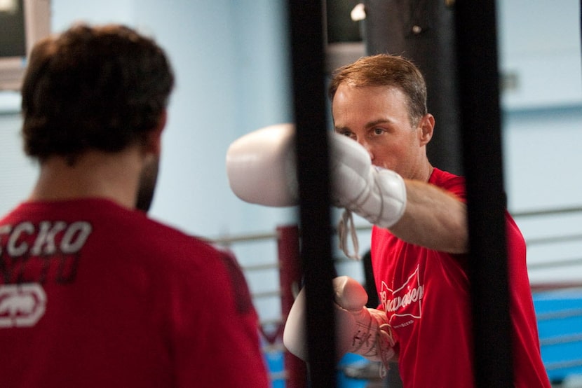 NASCAR driver Kevin Harvick trains with MMA fighter Johny Hendricks at Velociti Fitness...