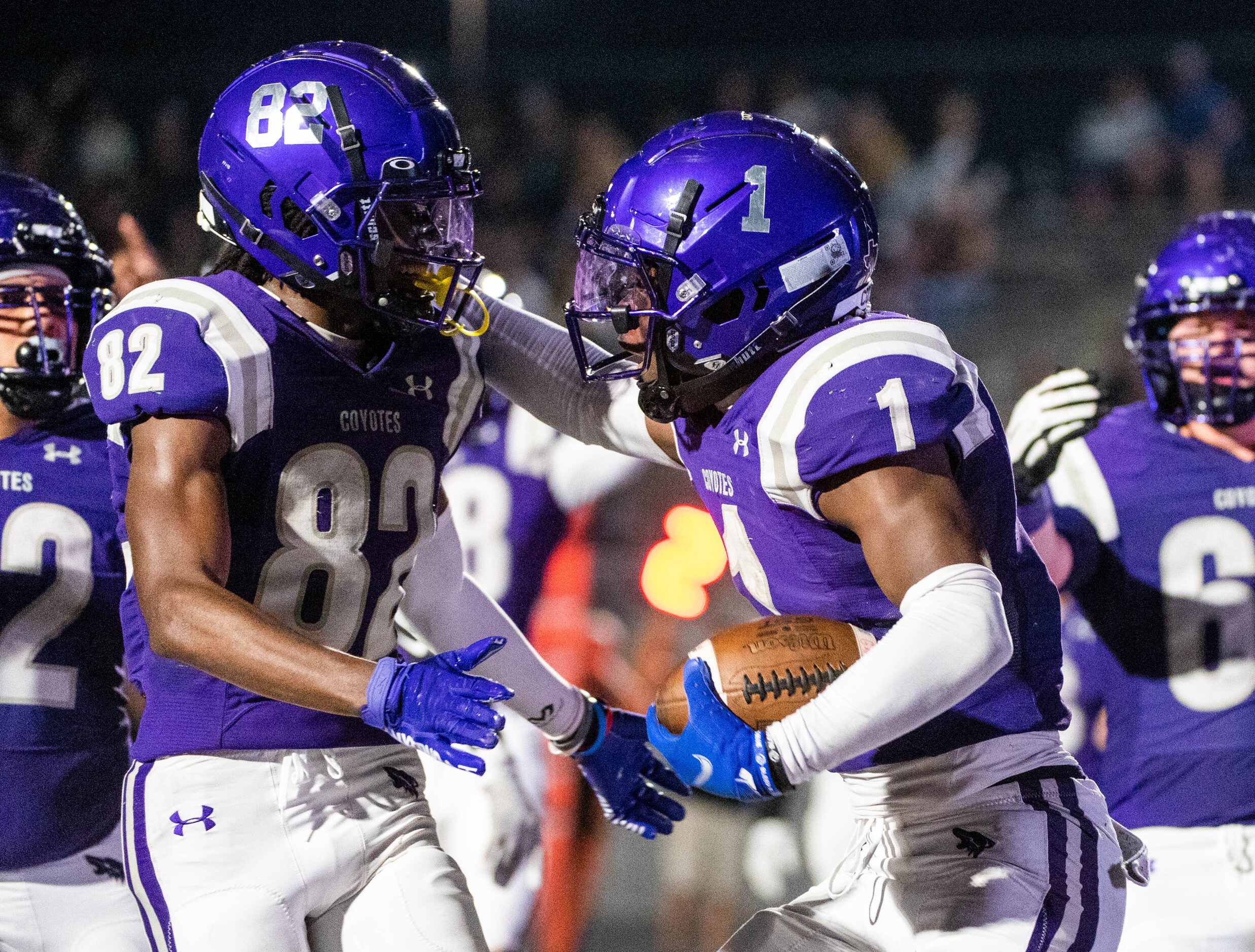 Anna’s Sean Steens (82) celebrates with Jambres Dubar after Dubar scored a touchdown in the...