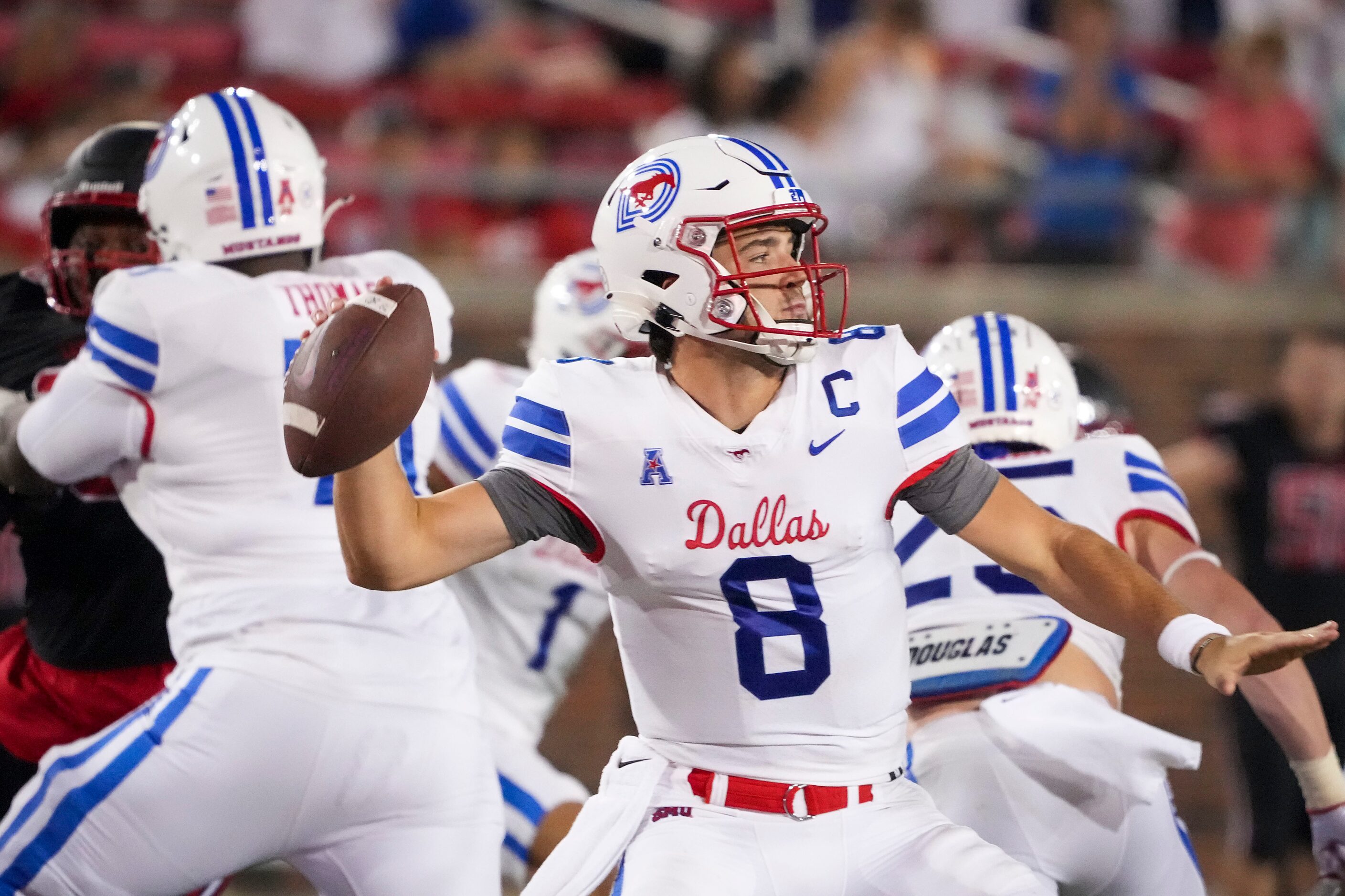 SMU quarterback Tanner Mordecai (8) throws a pass during the second half of an NCAA football...